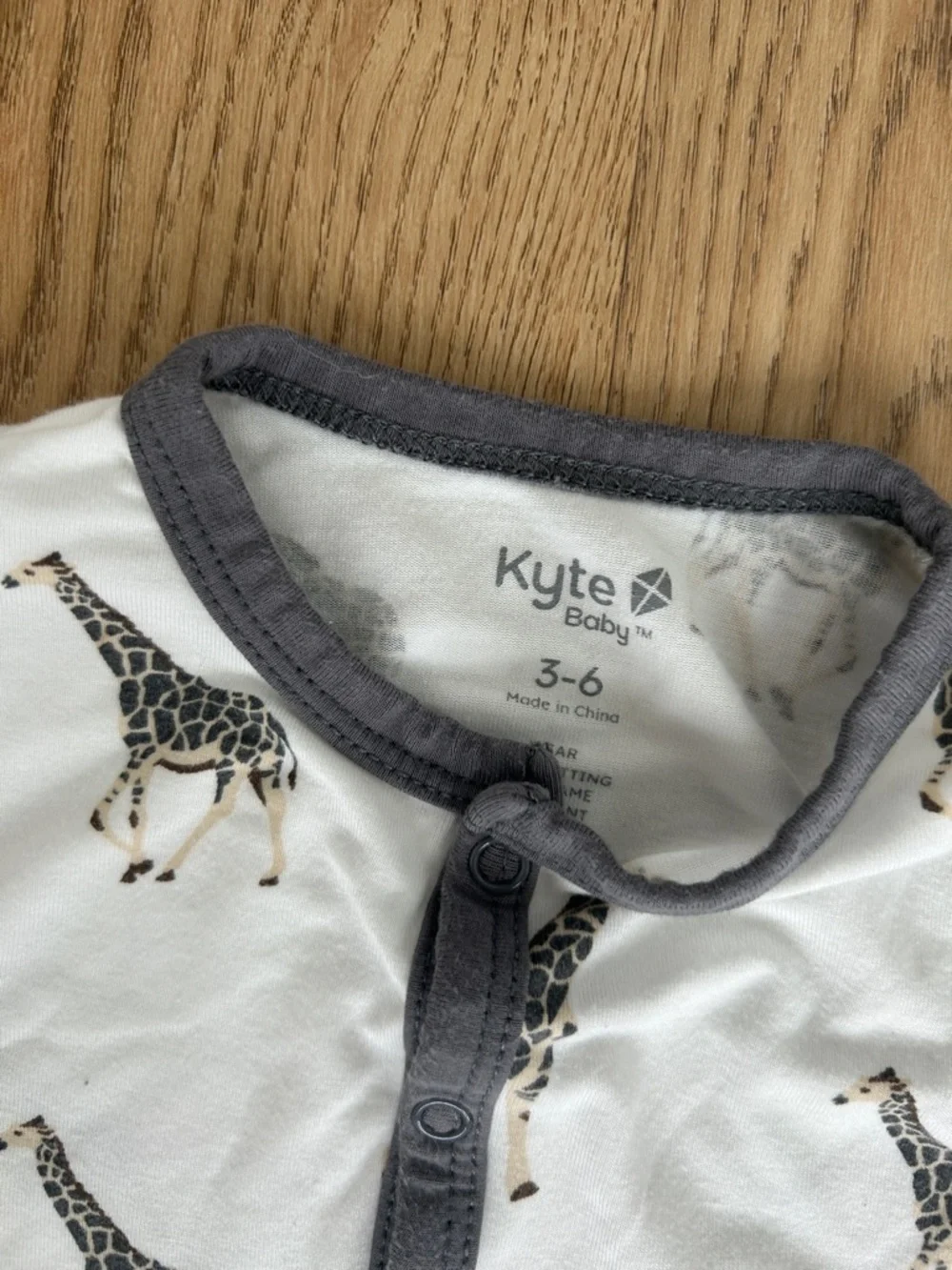 Kyte BABY White Footed One-Piece with Giraffe Print